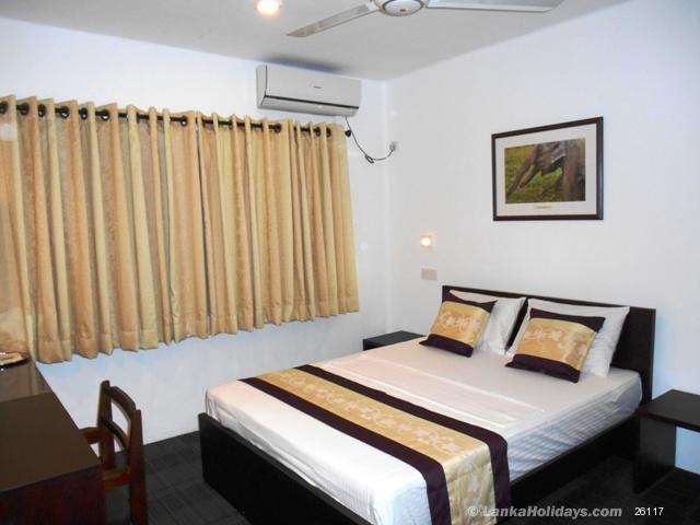 Queen Size Bed with bedside tables